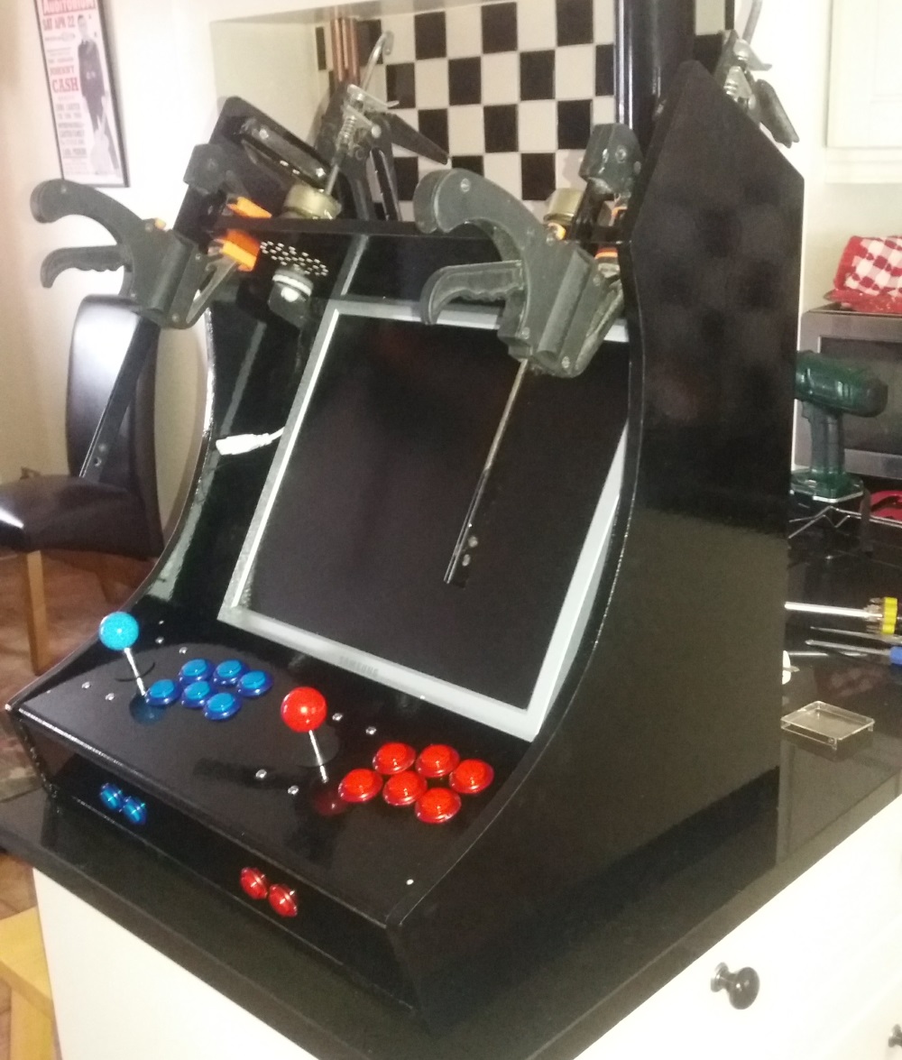 High gloss black finish on arcade cabinet